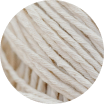 Close-up of soft, off-white twisted yarn strands forming a textured pattern.