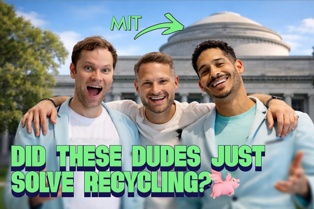 Three smiling men with arms around each other in front of MIT's building with text about solving recycling.