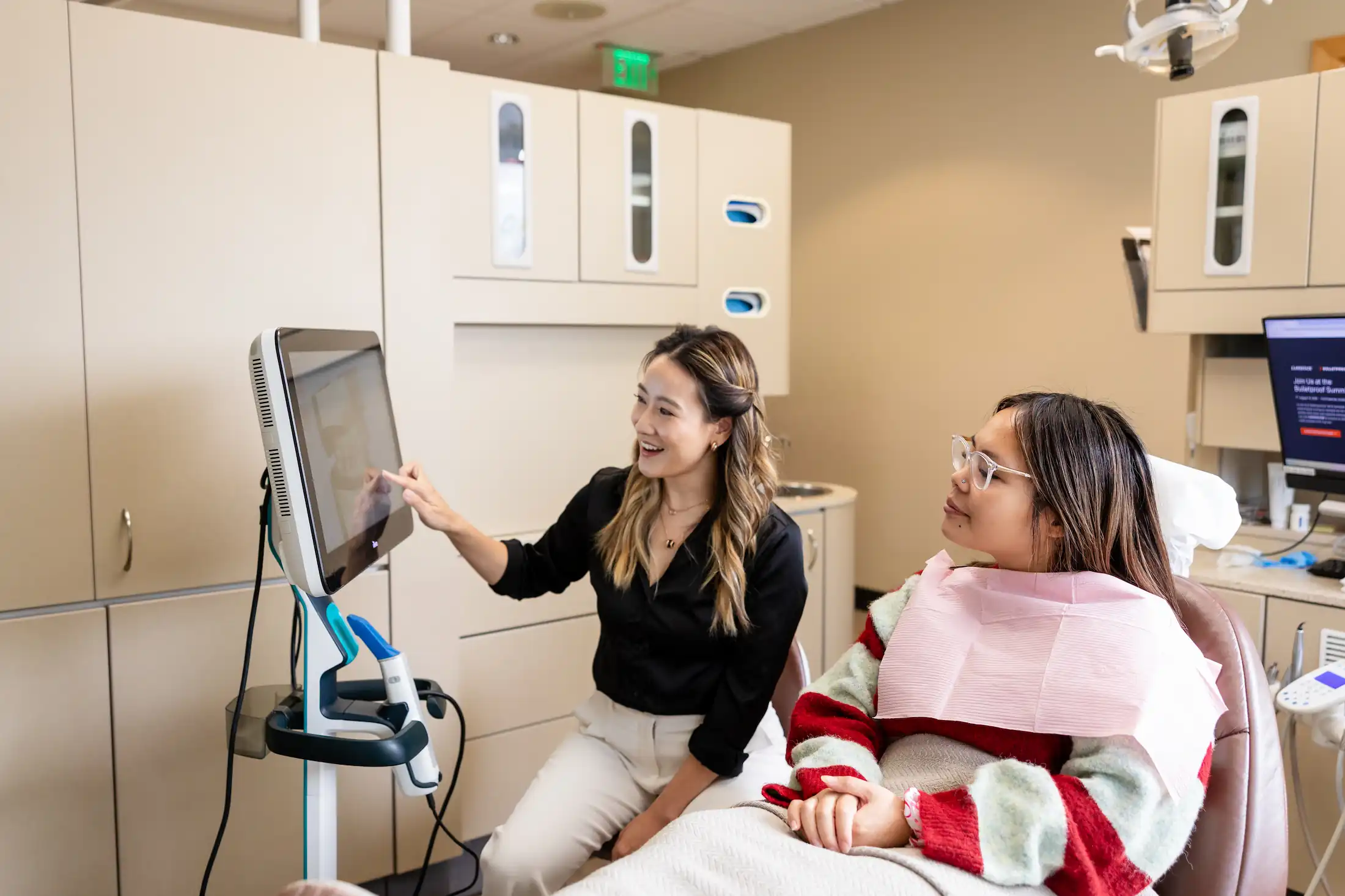 Redmond Way Dentist showing patient dental images on a screen in a modern dental office.