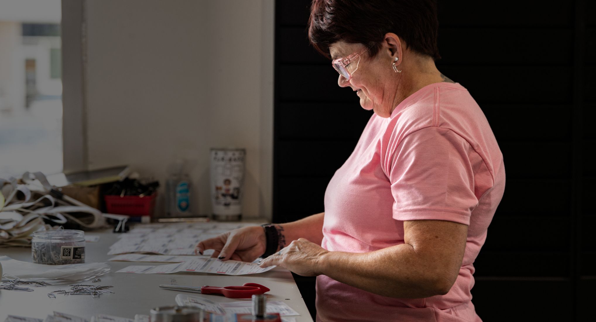 Accelevation team member assembling custom configurations at a workbench
