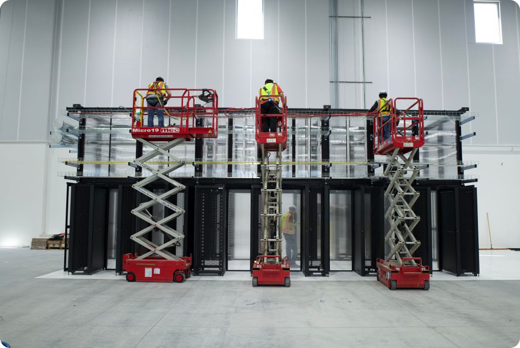 Overhead conveyance routing above racks