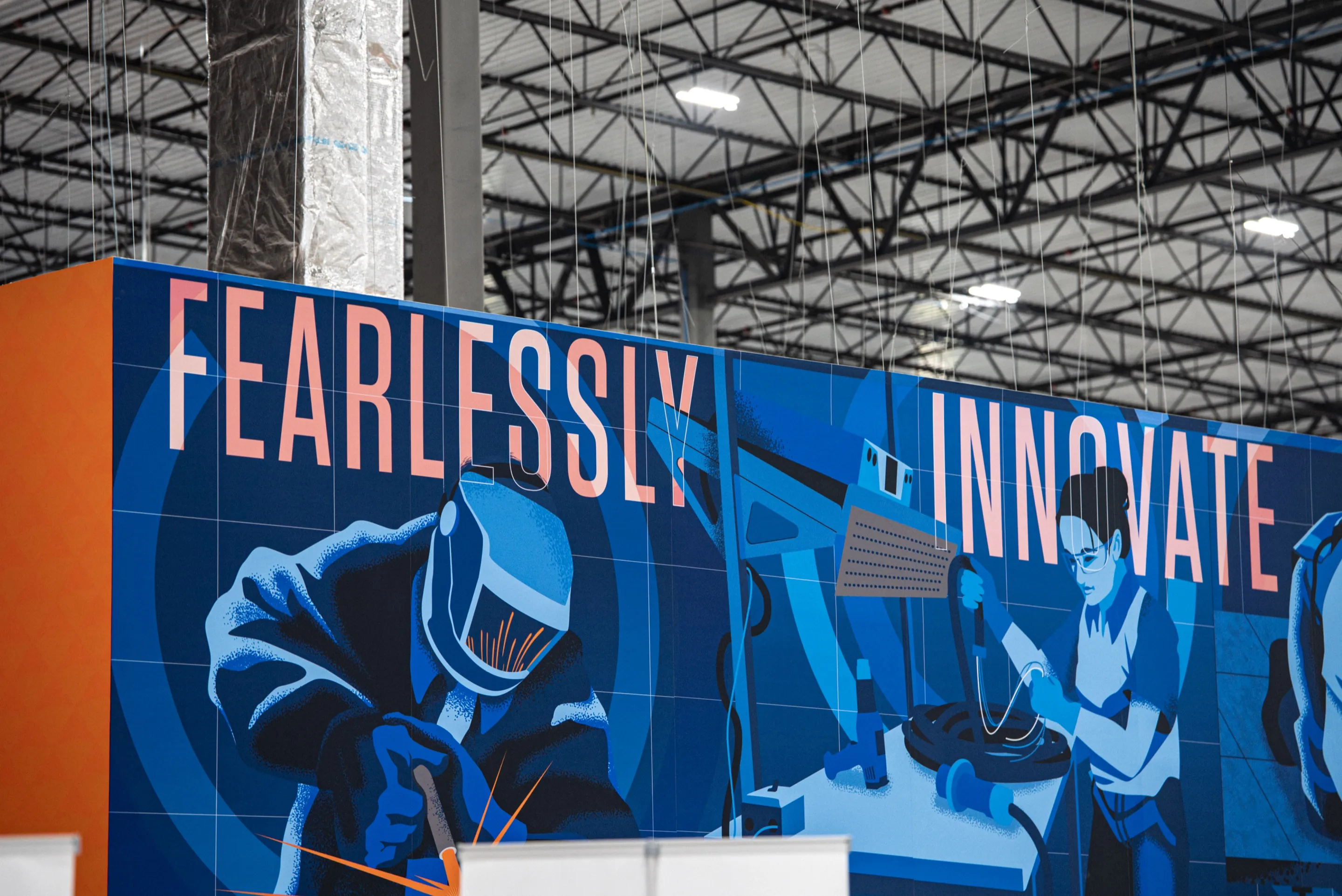 FEARLESSLY INNOVATE mural at an Accelevation facility