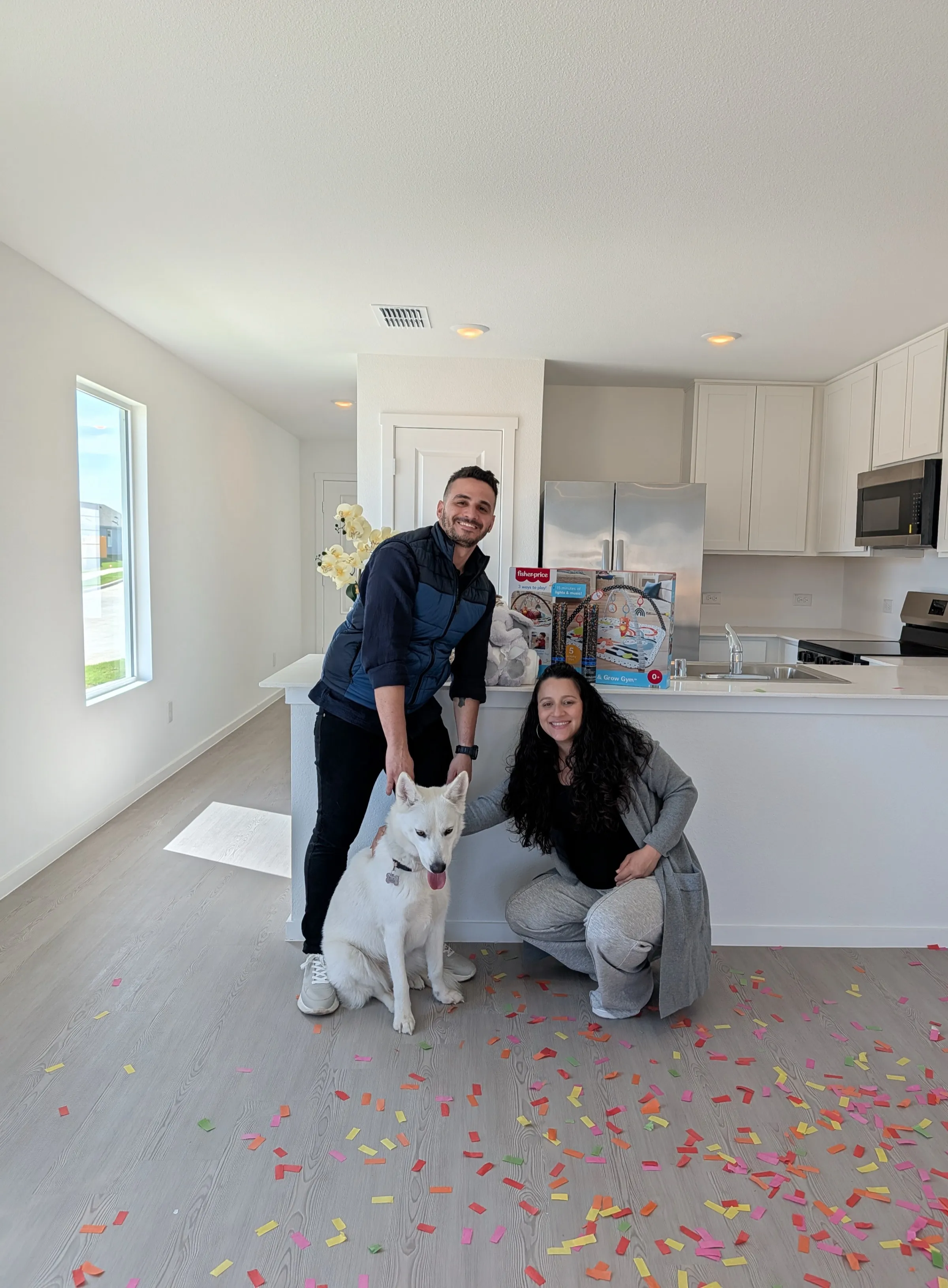 Andrés Sanabria and family at their new home, an AcceleHome homebuyer