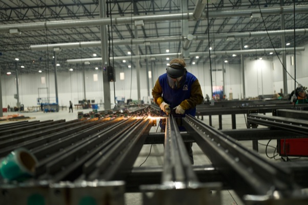 Welder fabricating structural steel