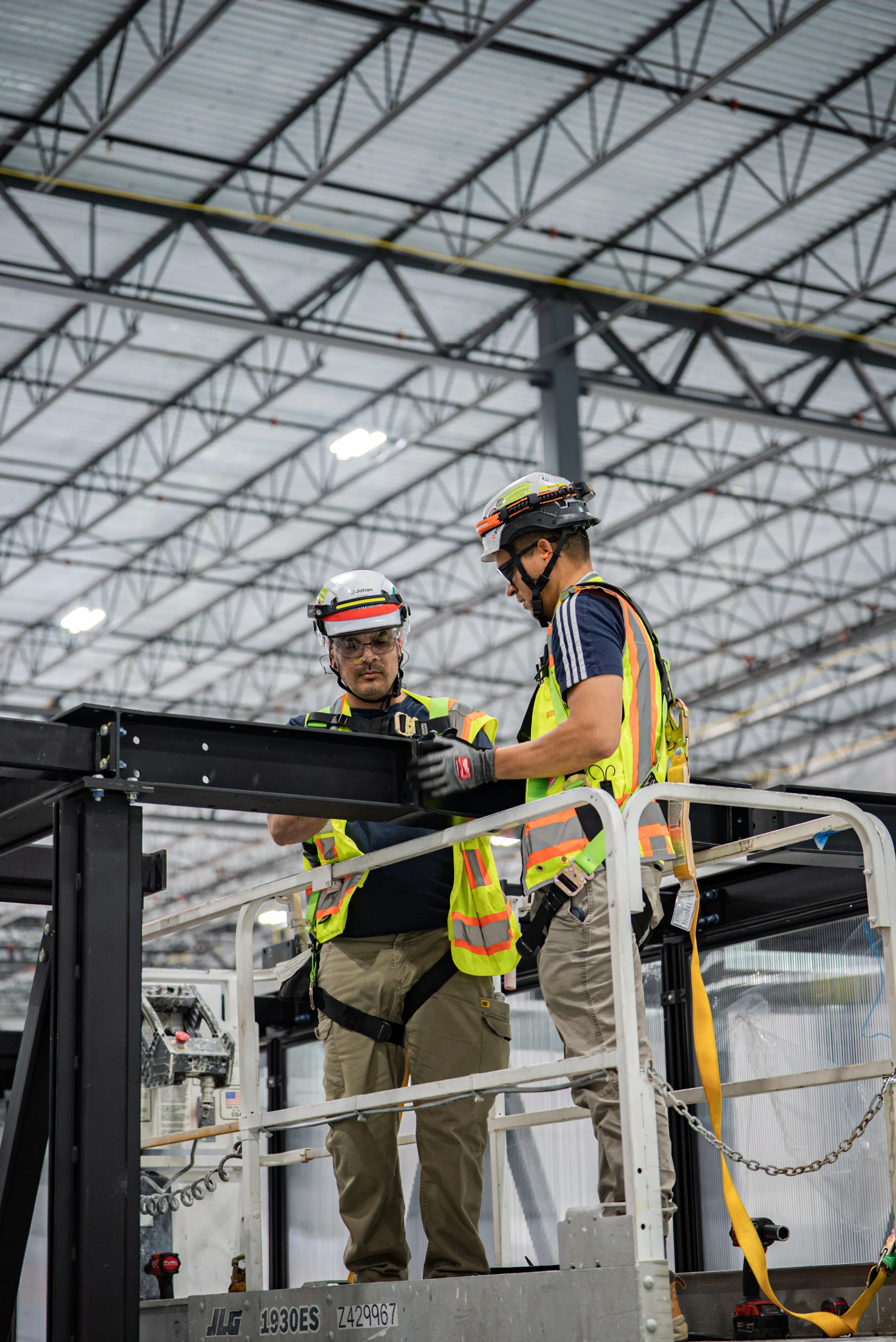 Accelevation crews installing containment panels during a data hall fit-out