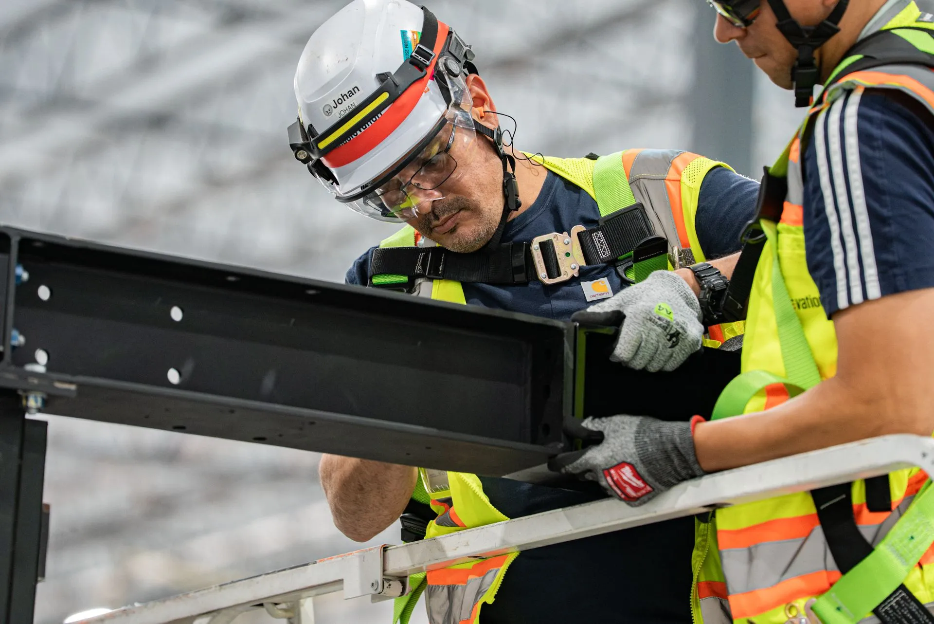 Accelevation crew installing overhead infrastructure