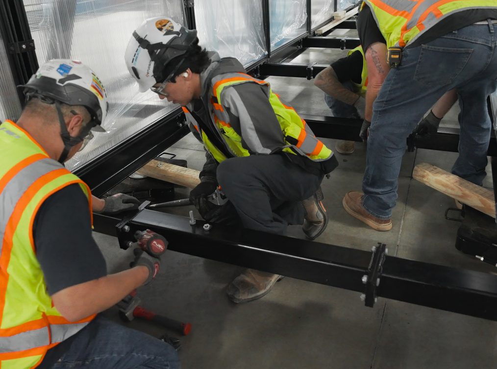 Field team installing infrastructure on site