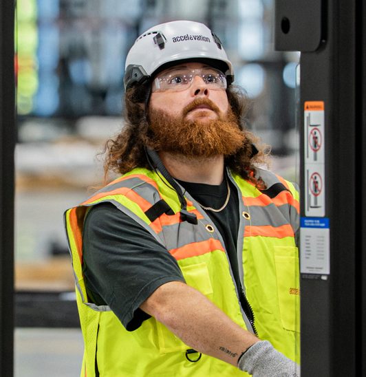 Technician reviewing an installed assembly