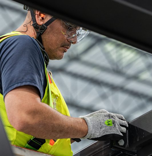 Technician fitting a cooling connection