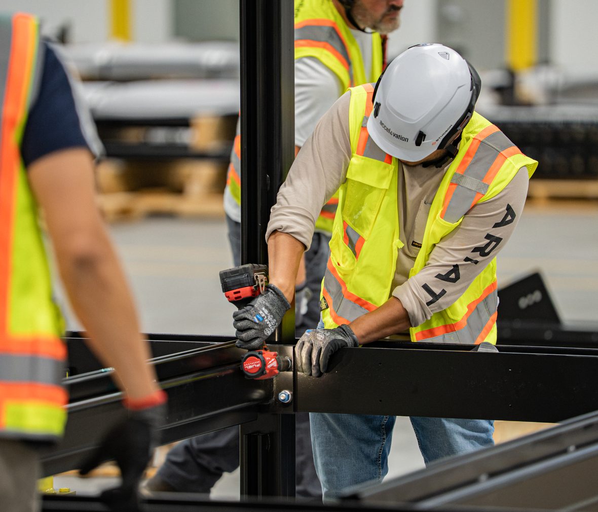 Accelevation crew drilling structural steel