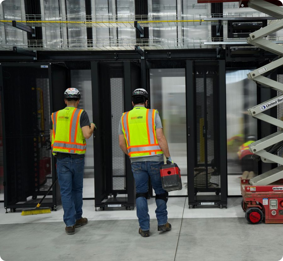 Accelevation technicians integrating equipment into racks