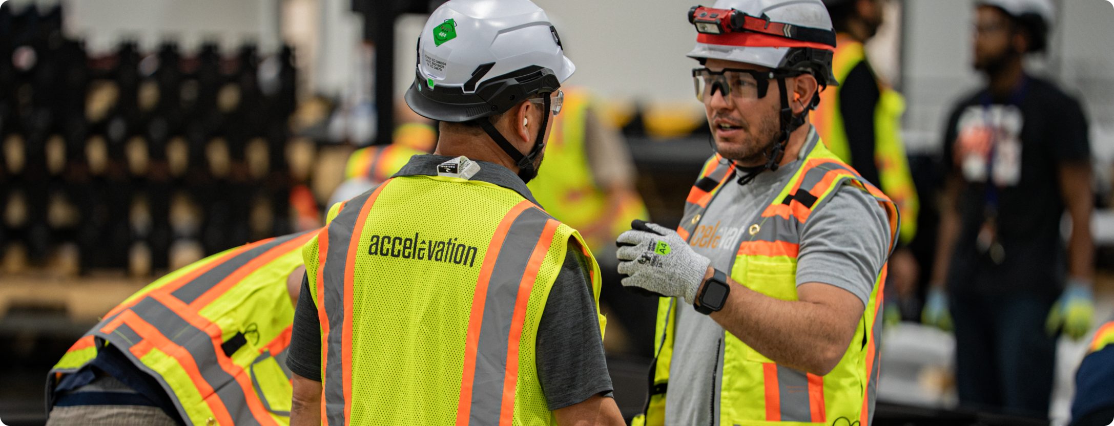 Accelevation technicians coordinating a rack deployment on the floor