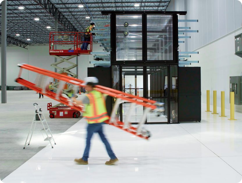 Accelevation field team working in a data hall during a nationwide deployment