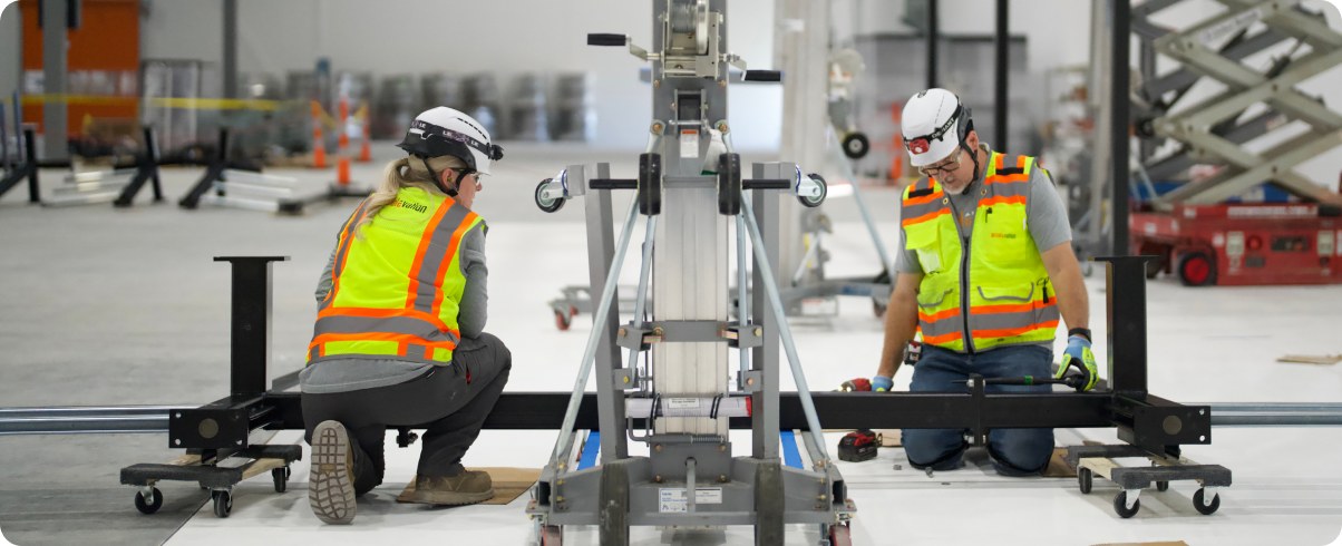 Accelevation installers positioning lift equipment for an accelerated deployment