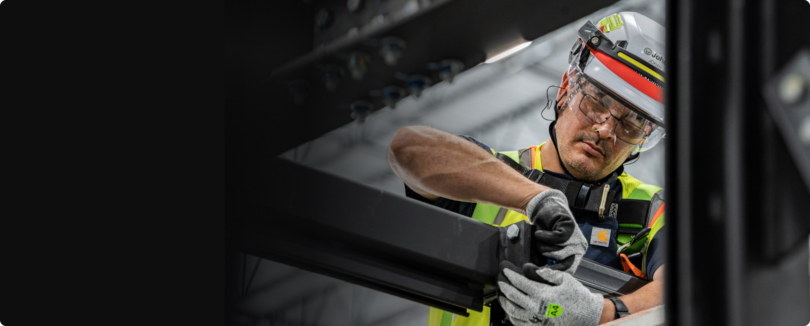 Accelevation technician servicing overhead infrastructure