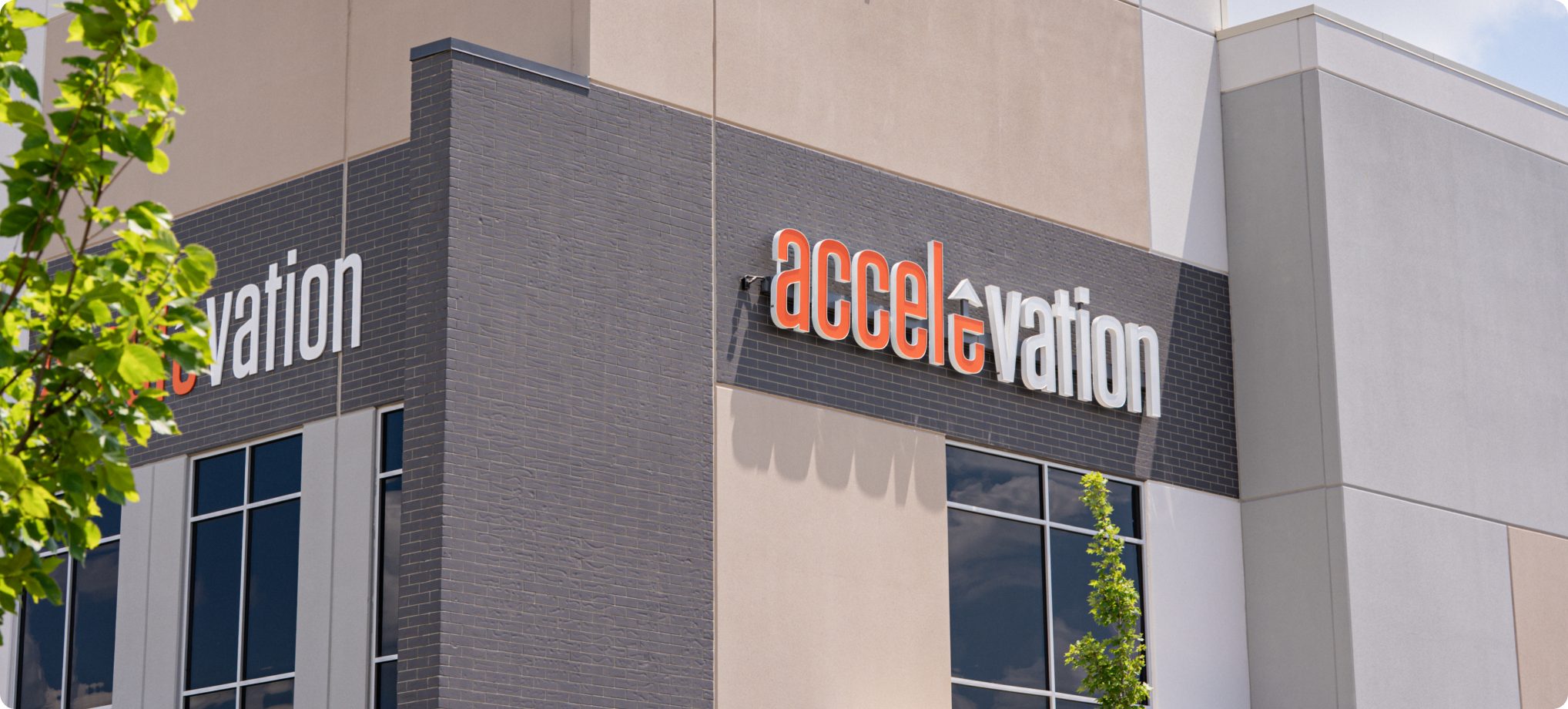Accelevation signage on the exterior of a company facility