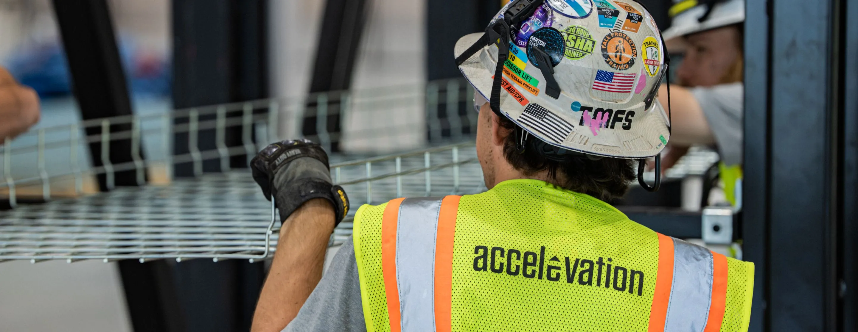 Accelevation employees collaborating in the facility