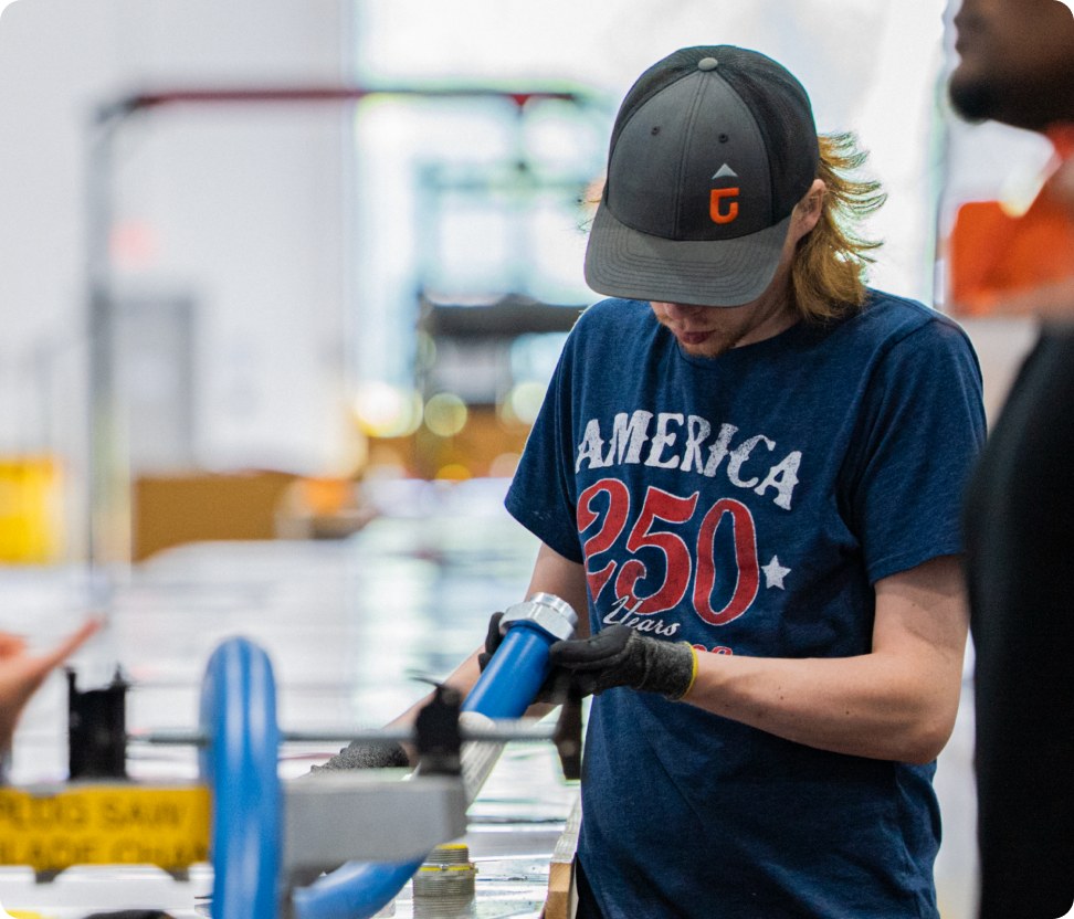 Accelevation team members working together on the shop floor