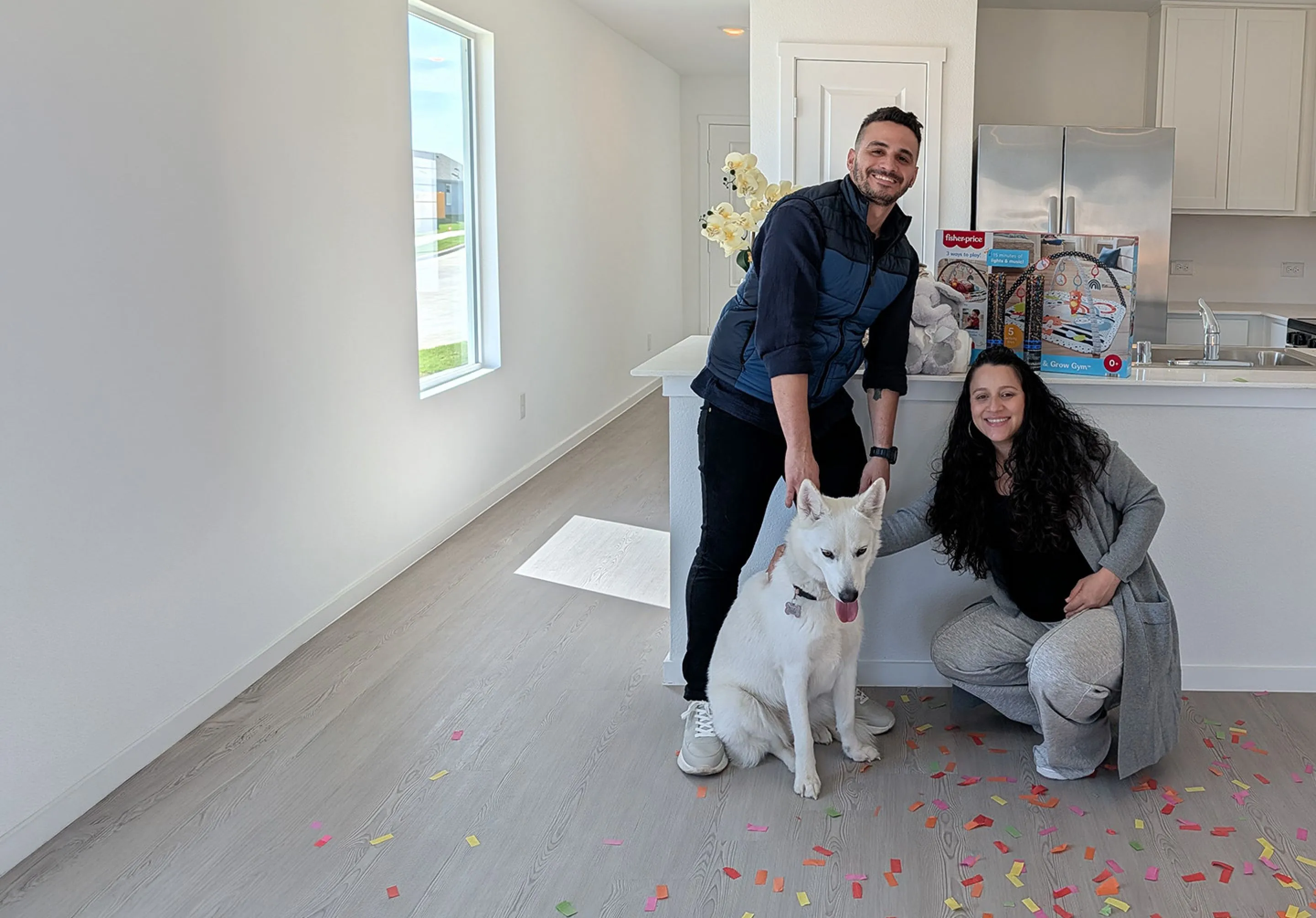 Andrés Sanabria and family at their new home, an AcceleHome homebuyer