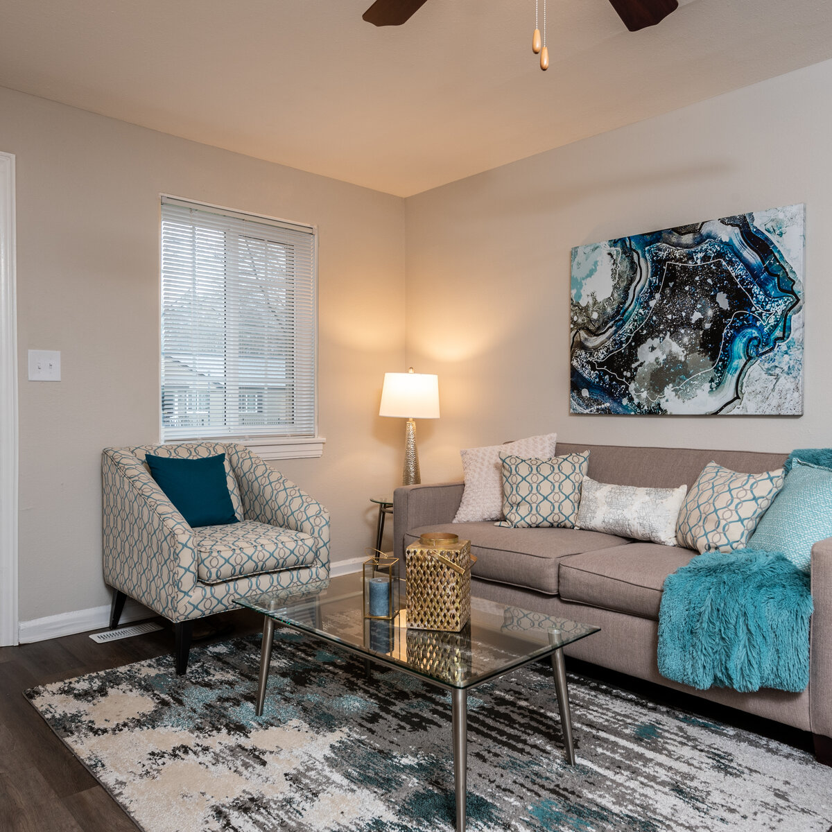 well lit Living room with window couch and chair