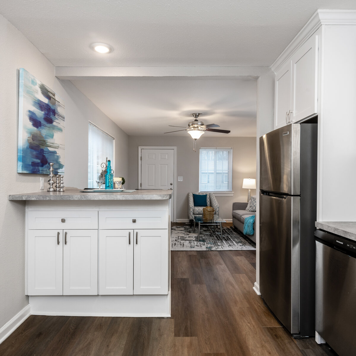 Kitchen with white cabinets and stainless steal appliances
