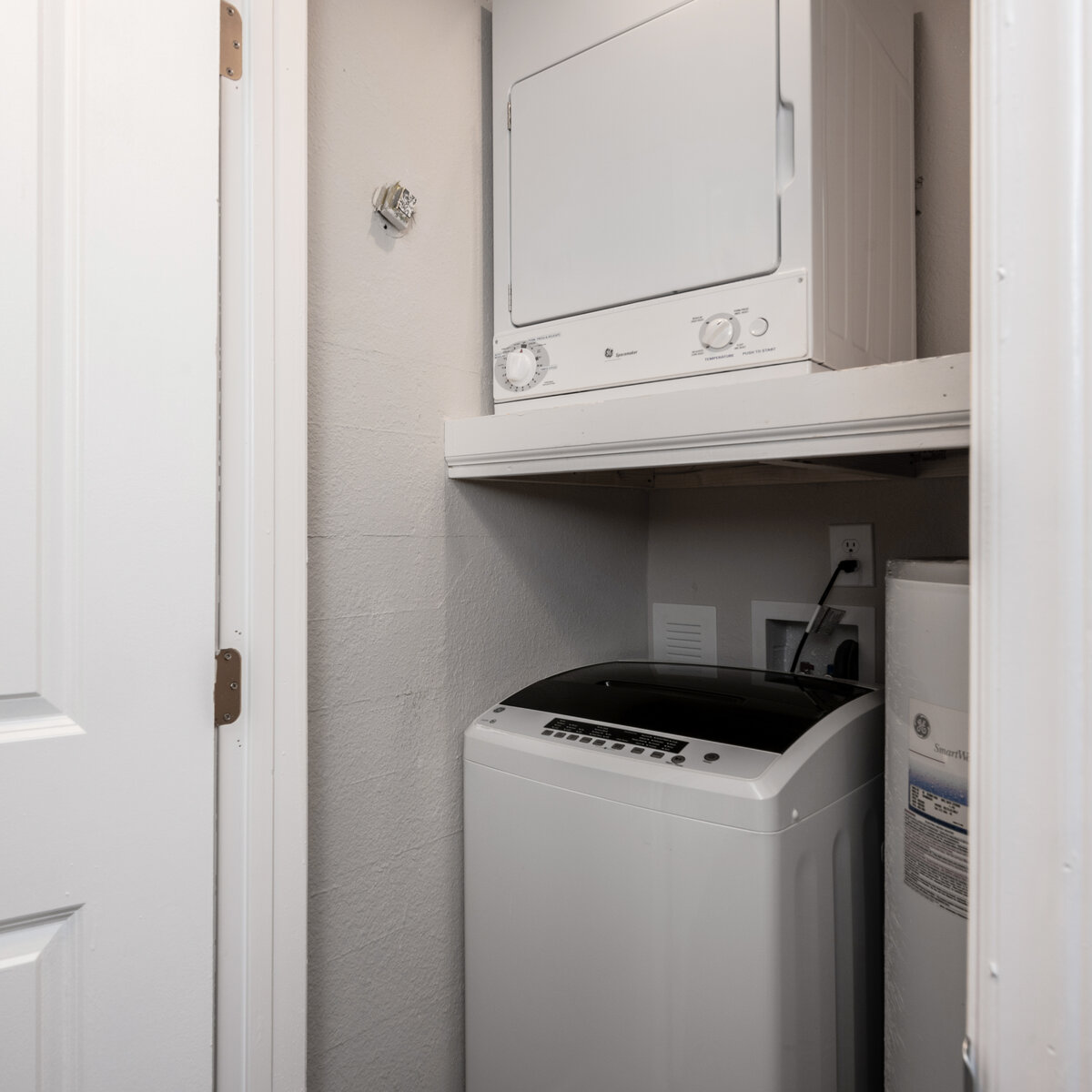 full size washer and dryer in hallway closet 