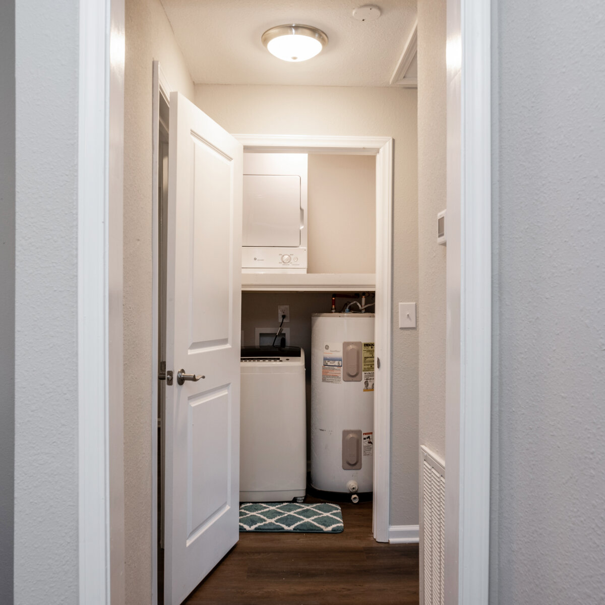 full size washer and dryer in hallway closet 