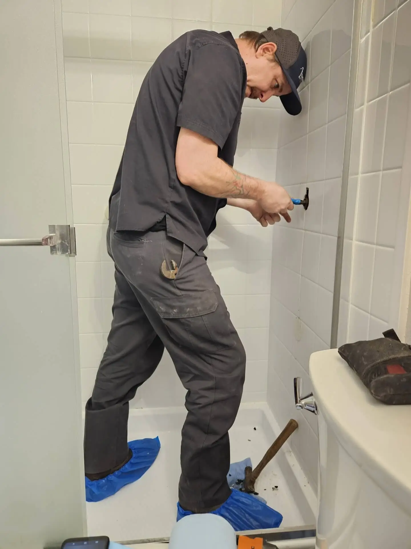 plumber repairing a leak
