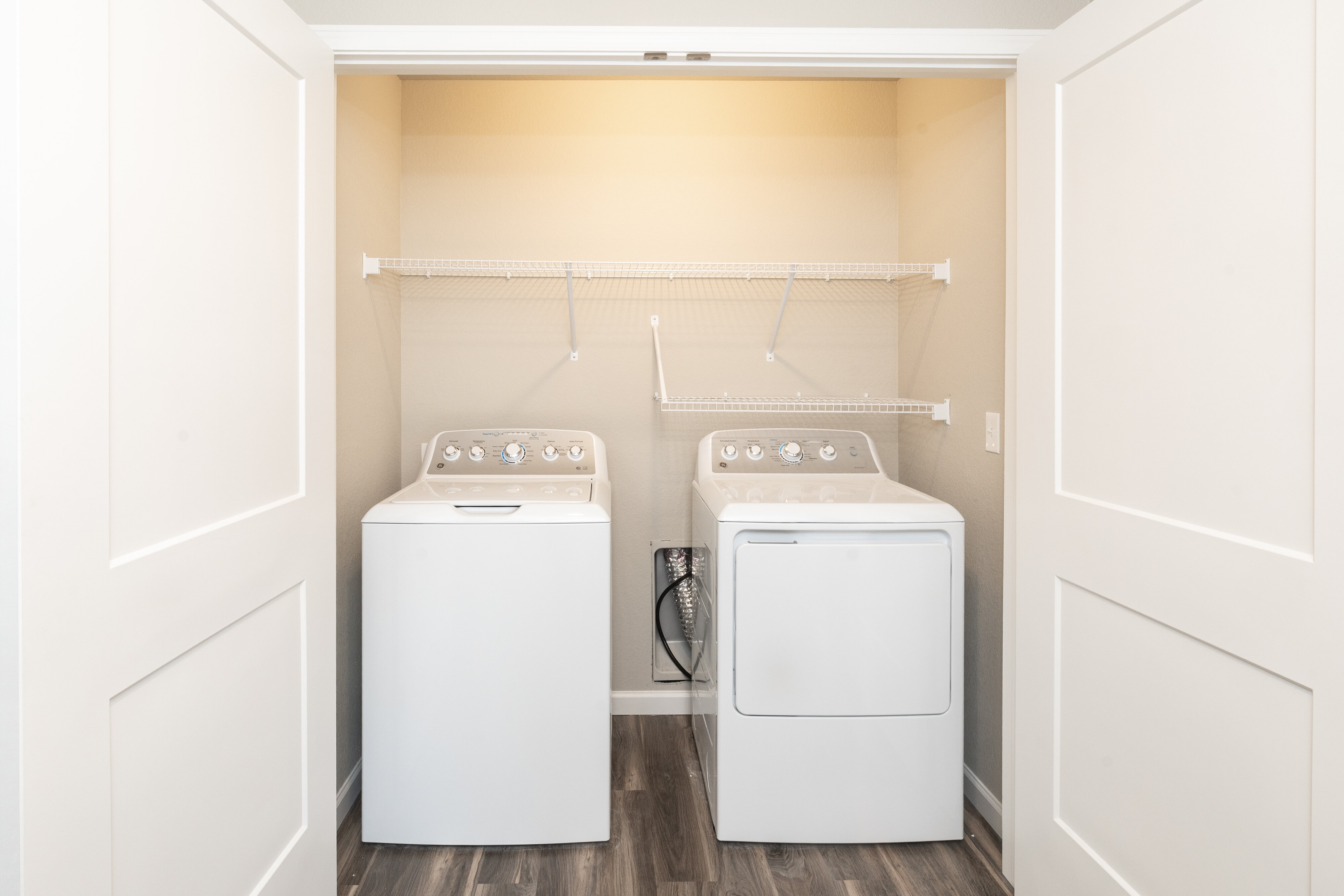 Laundry closet with washer and dryer