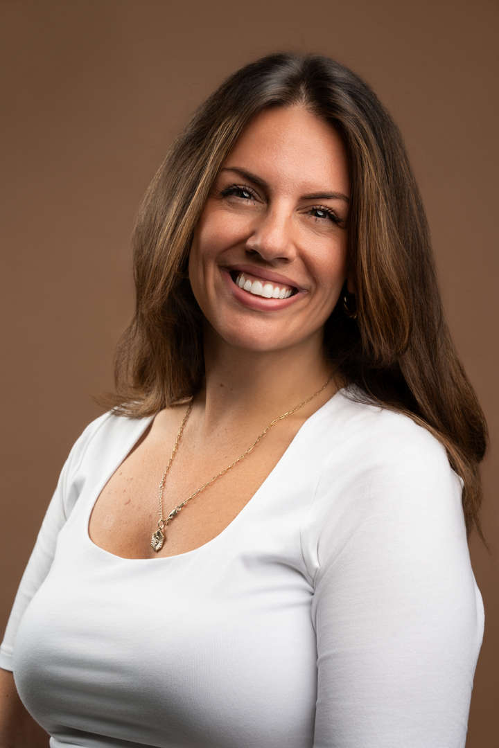Ms. Rocchio smiling in a professional staff headshot