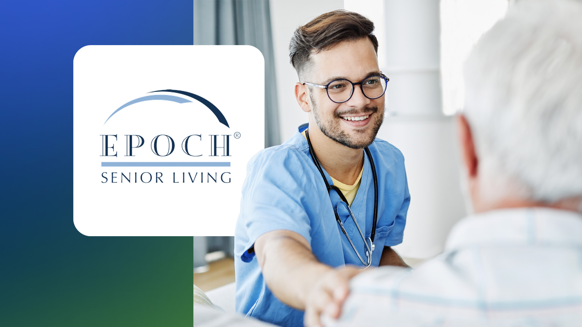 Smiling male nurse in blue scrubs comforting elderly person with hand on shoulder.