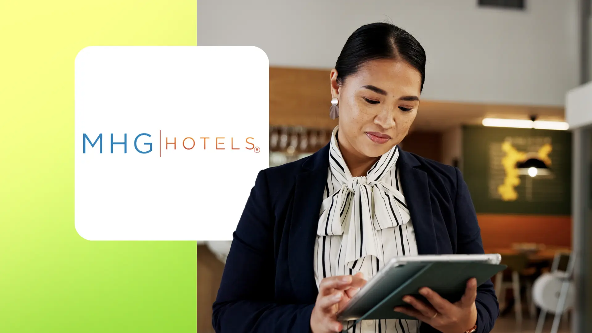 Businesswoman using a tablet with MHG Hotels logo on a green background to her left.