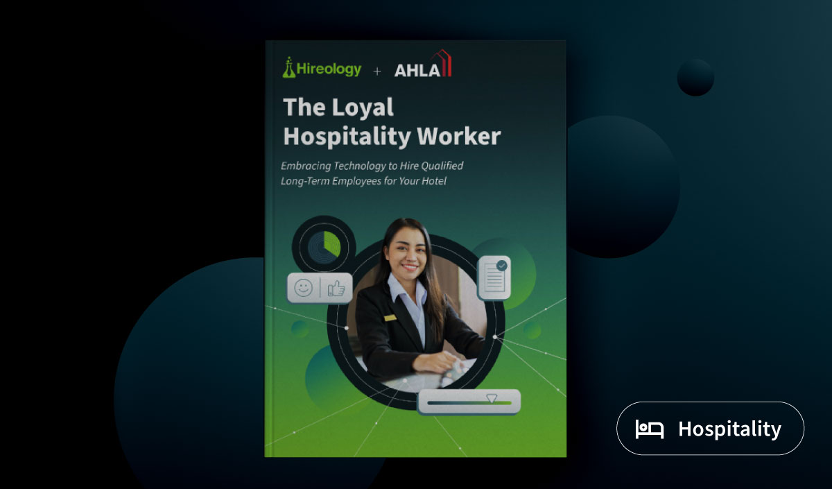 Cover of guide titled The Loyal Hospitality Worker showing a smiling hotel worker in uniform.