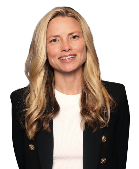 Smiling woman with long blonde hair wearing a black blazer over a white top.