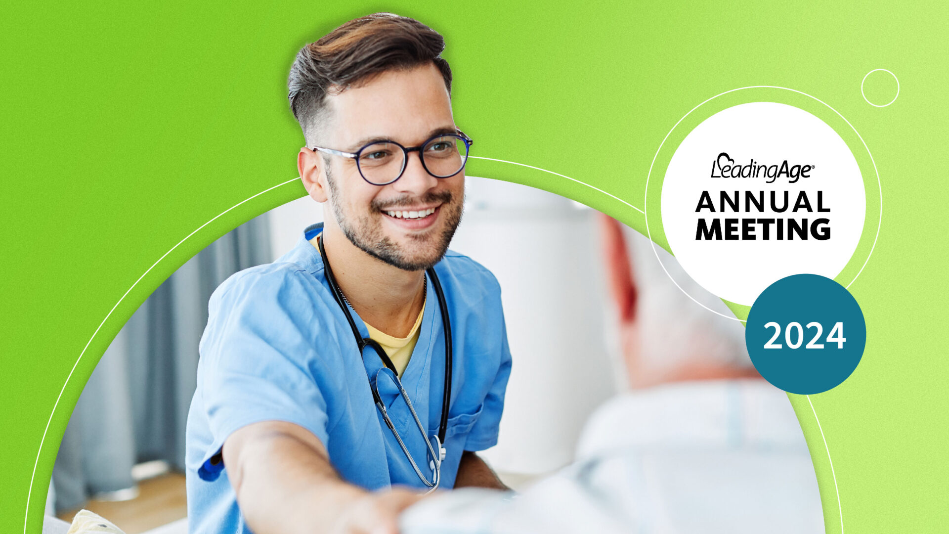 Smiling male healthcare worker in blue scrubs with stethoscope reaching out to elderly person.