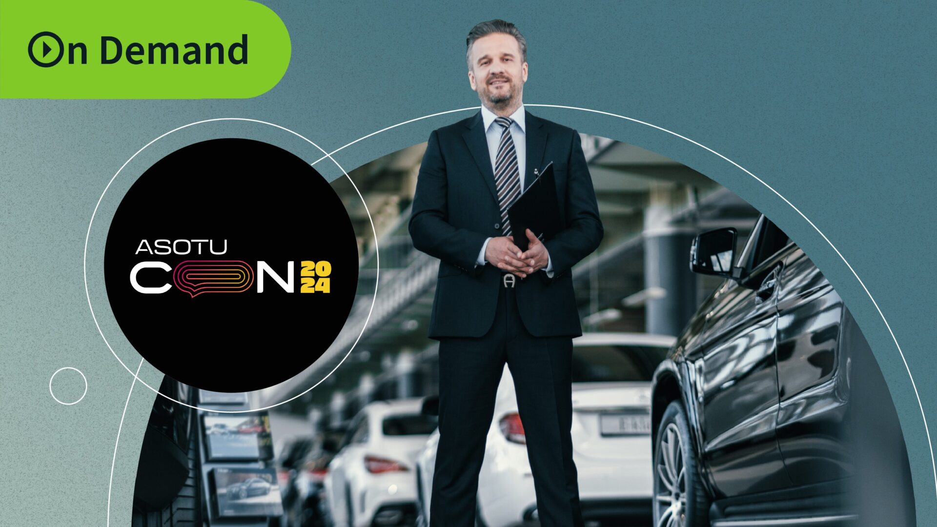 Man in business suit holding folder stands in a showroom with luxury cars.