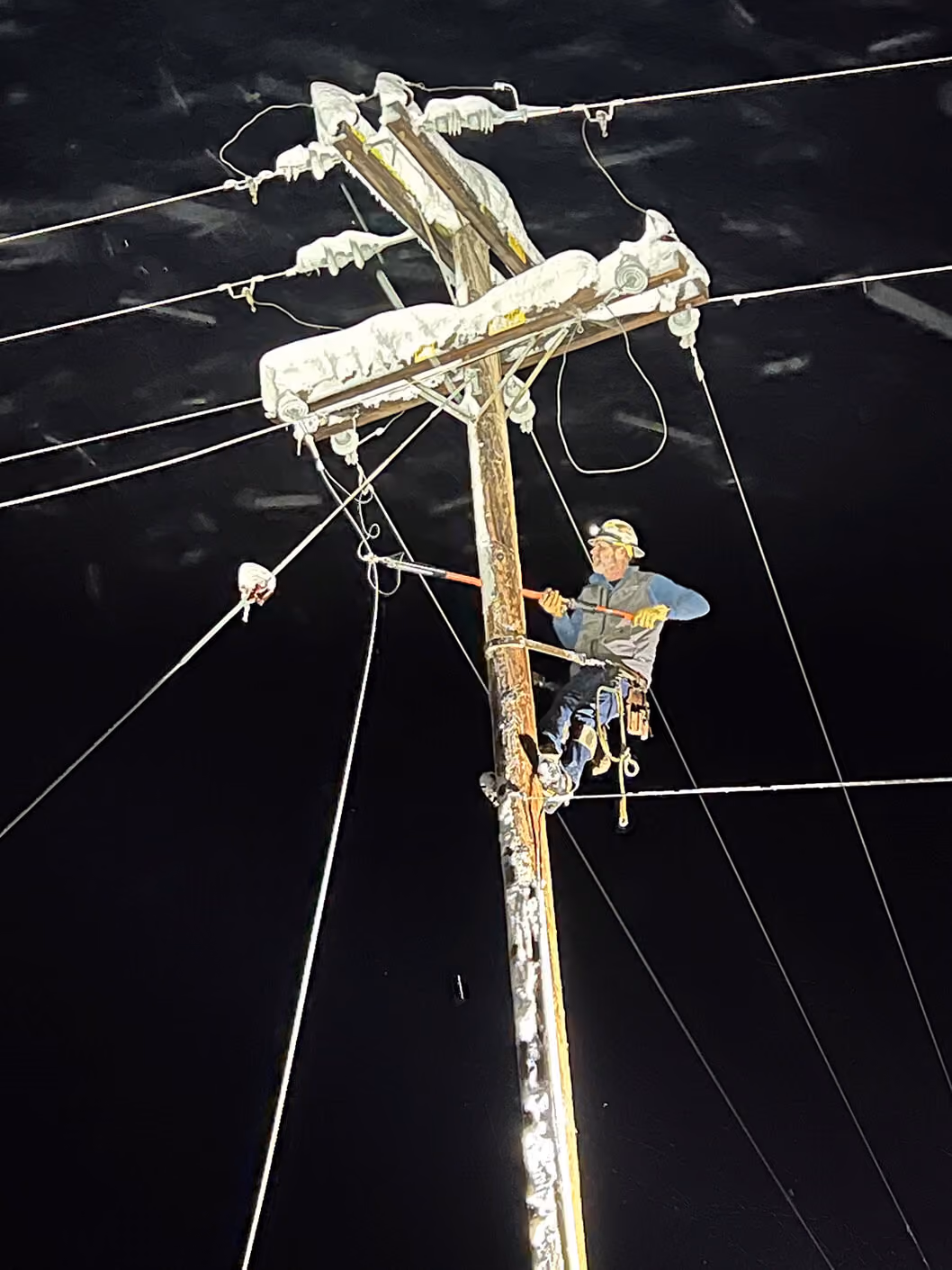 A man working on powerlines