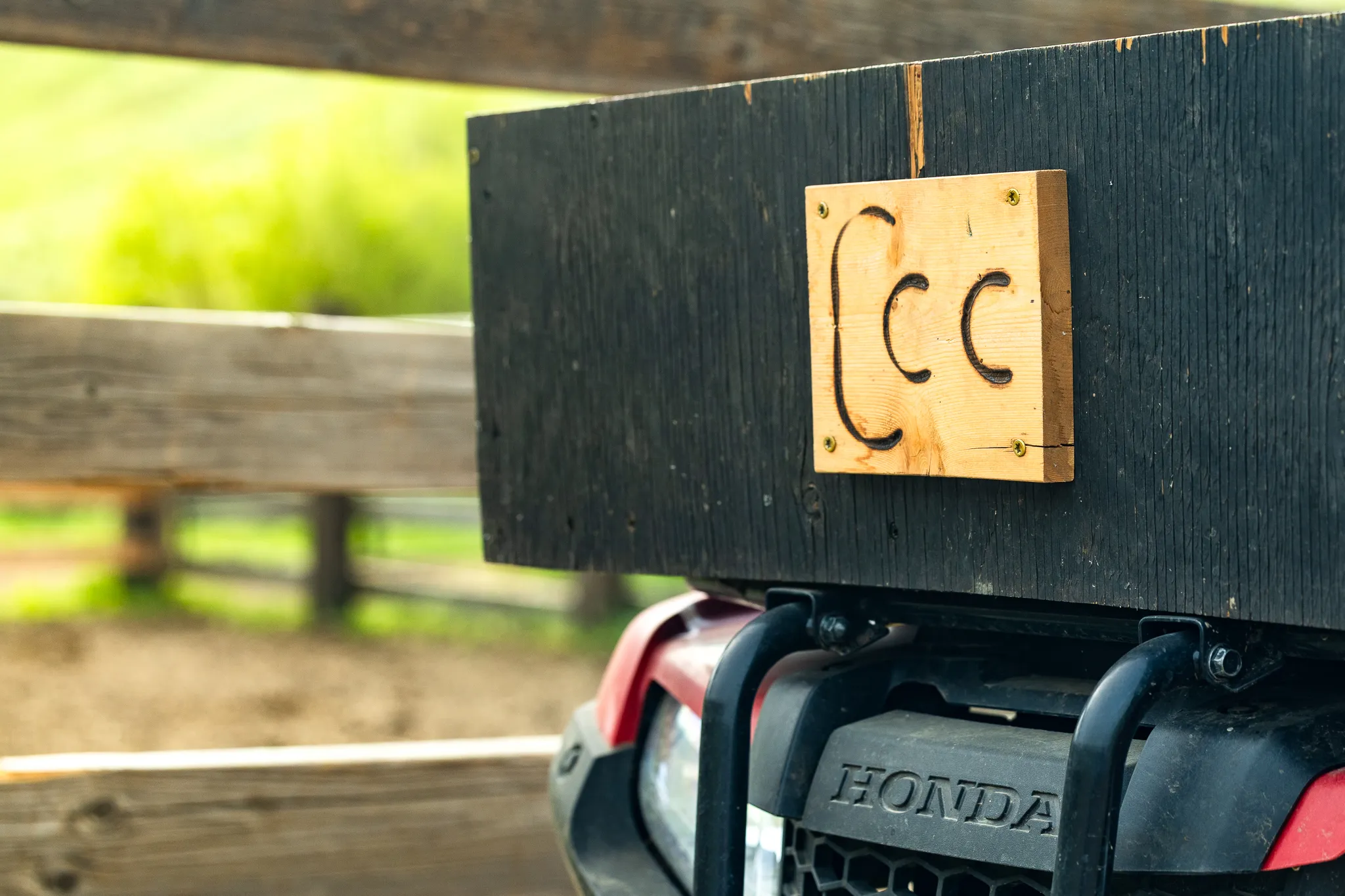 The CCC brand mark on a gate