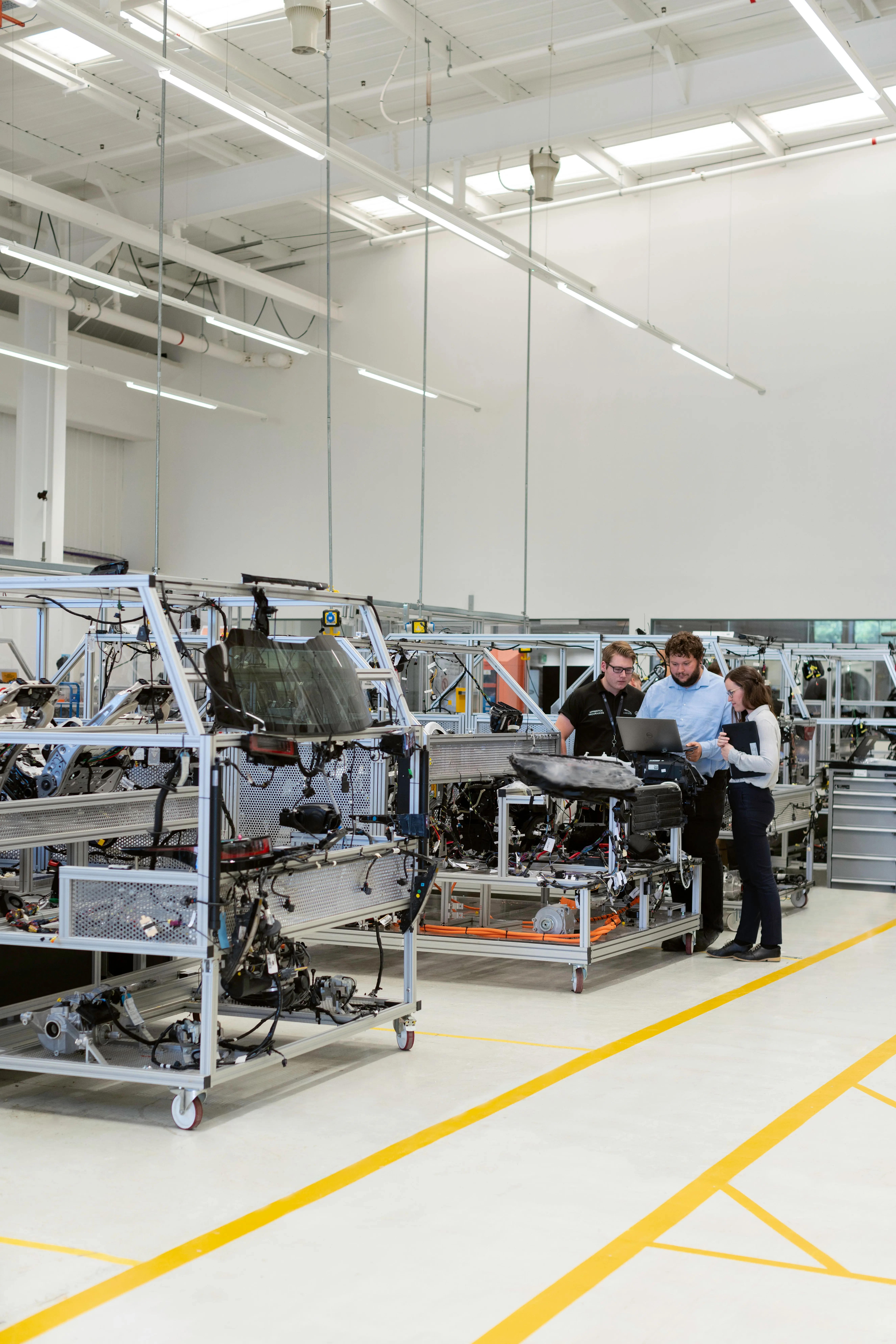 Engineers looking at issue on factory line