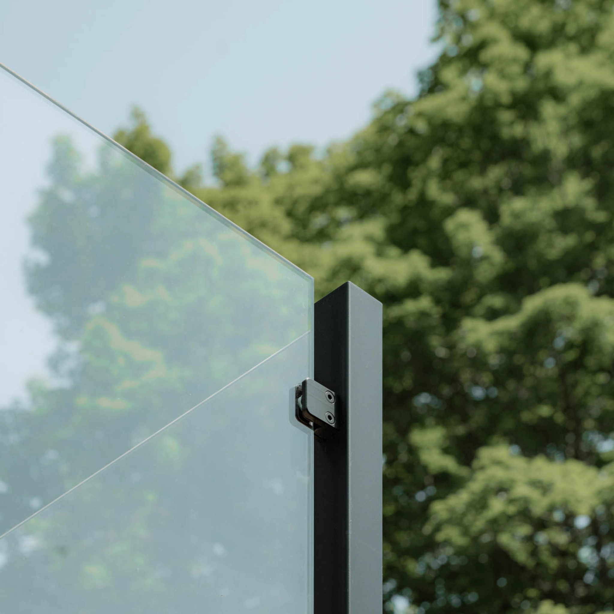 Close up on a corner post in an exterior glass post system
