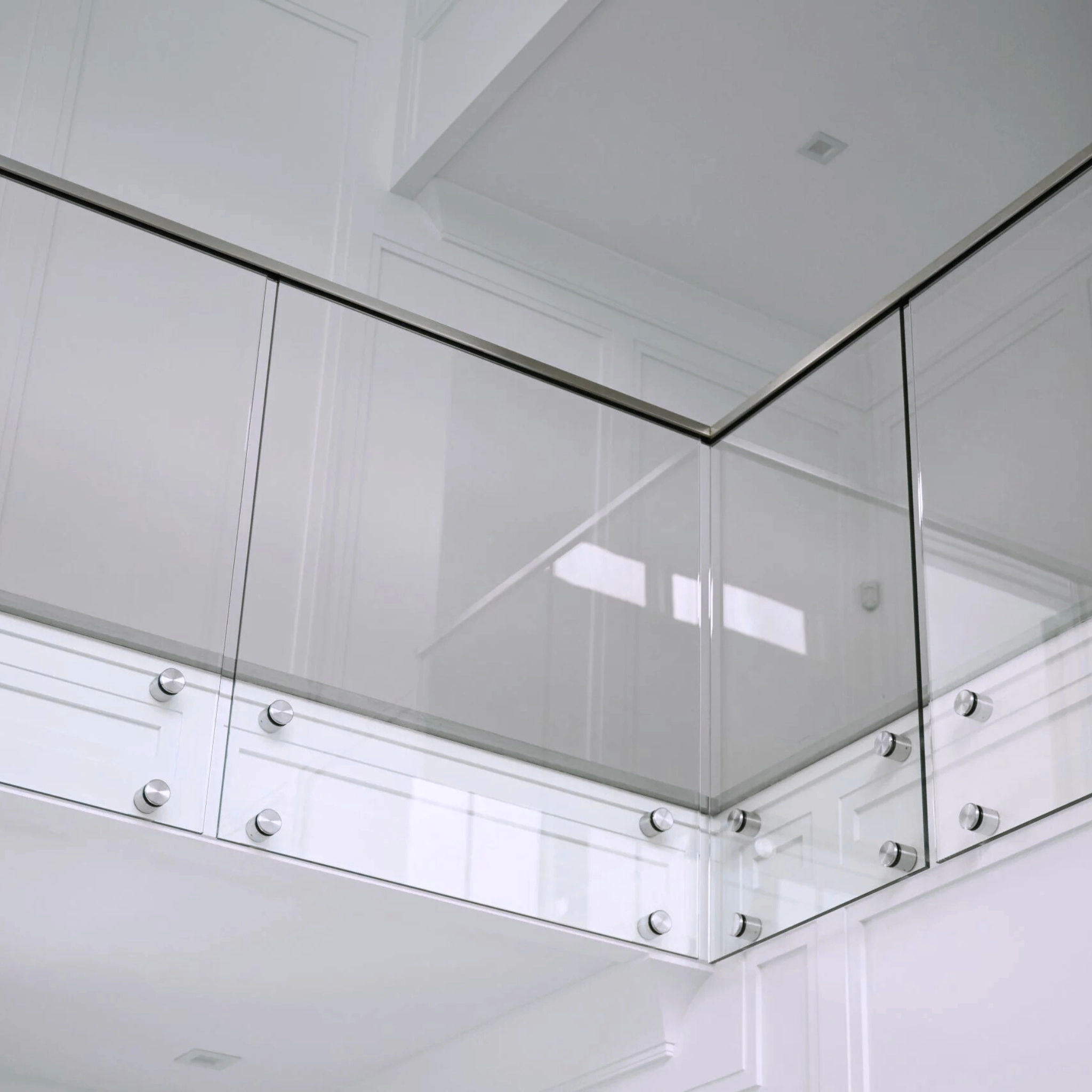 A balcony with a stainless steel Standoff Pins glass system