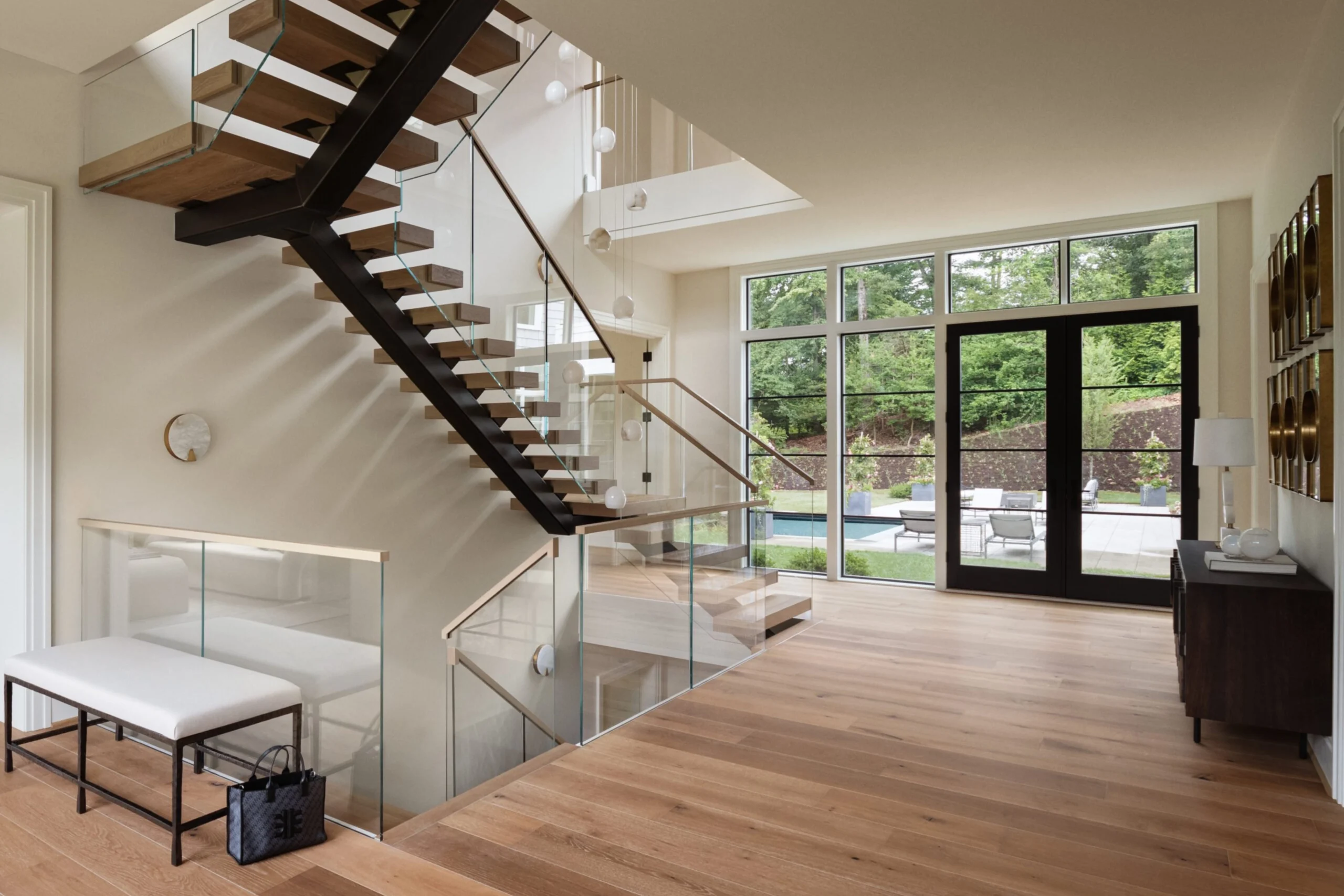 A U-turn FLIGHT Mono with Vedera glass railing in a large, light-filled home