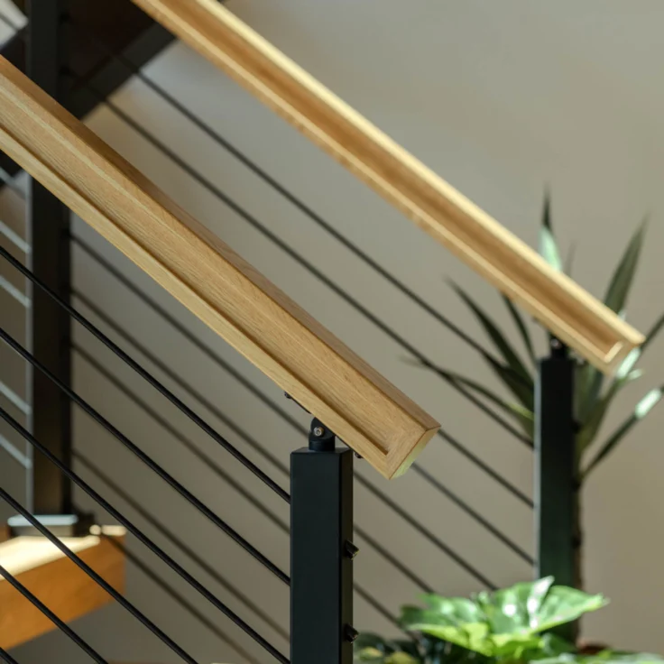 A 6004 wood handrail paired with Onyx rod infill