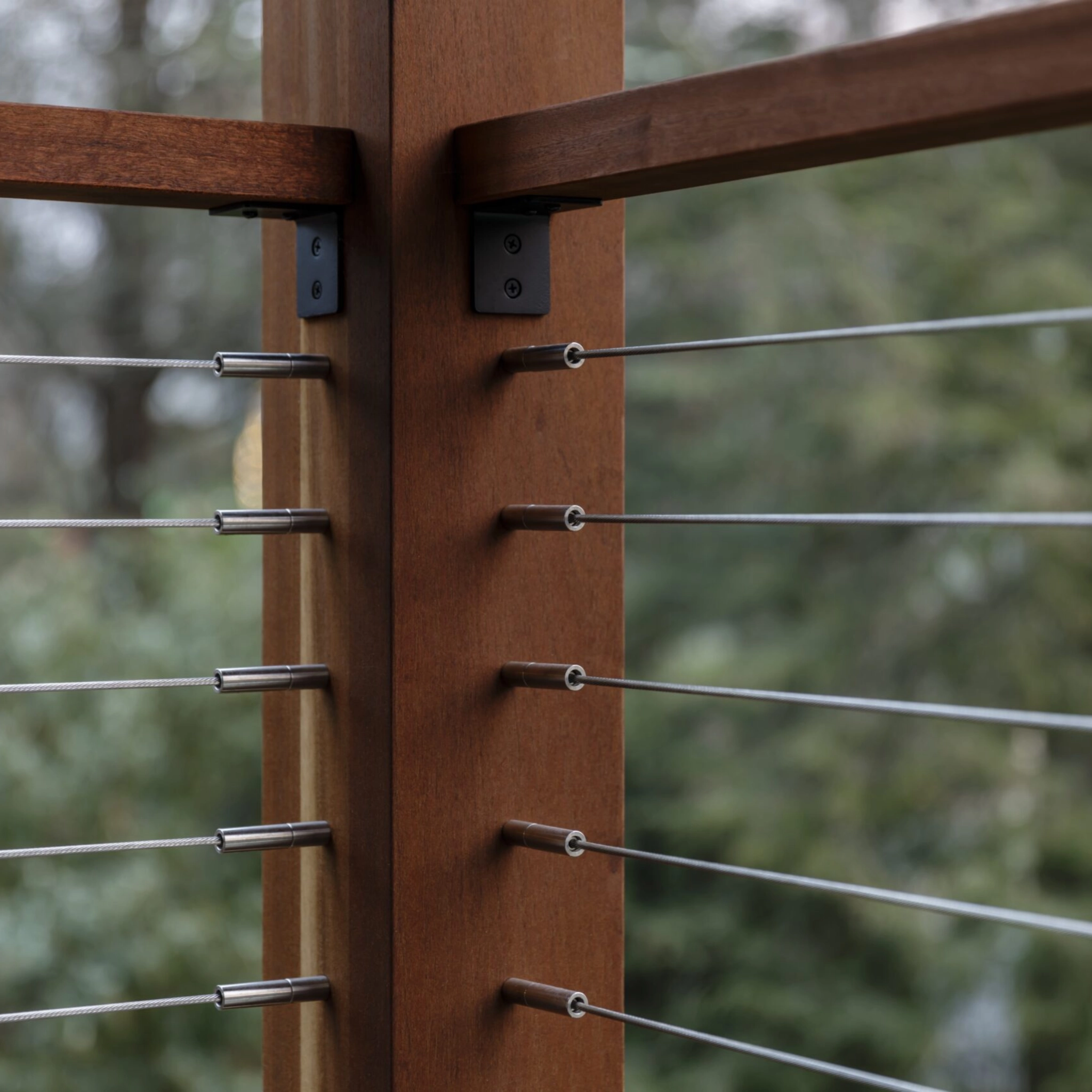 DriveTite cable railing hardware installed in a wood post