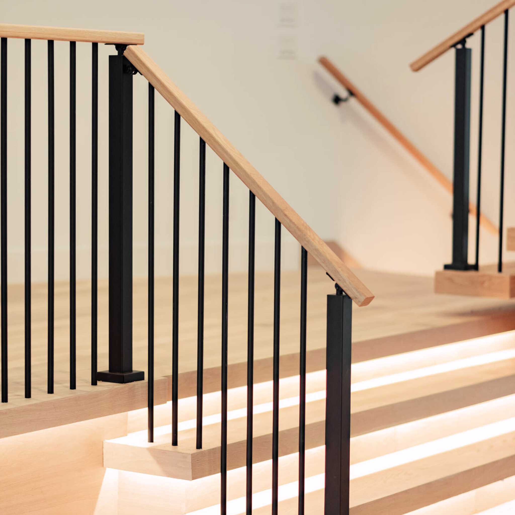 Iron baluster infill on a Signature stair railing