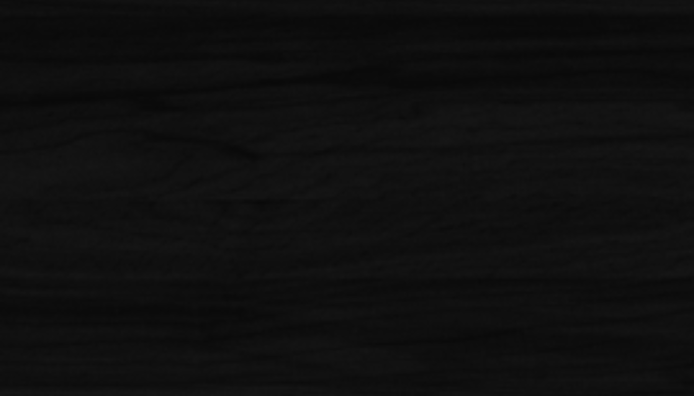 Swatch of a satin black finish with a fine, even grain showing through