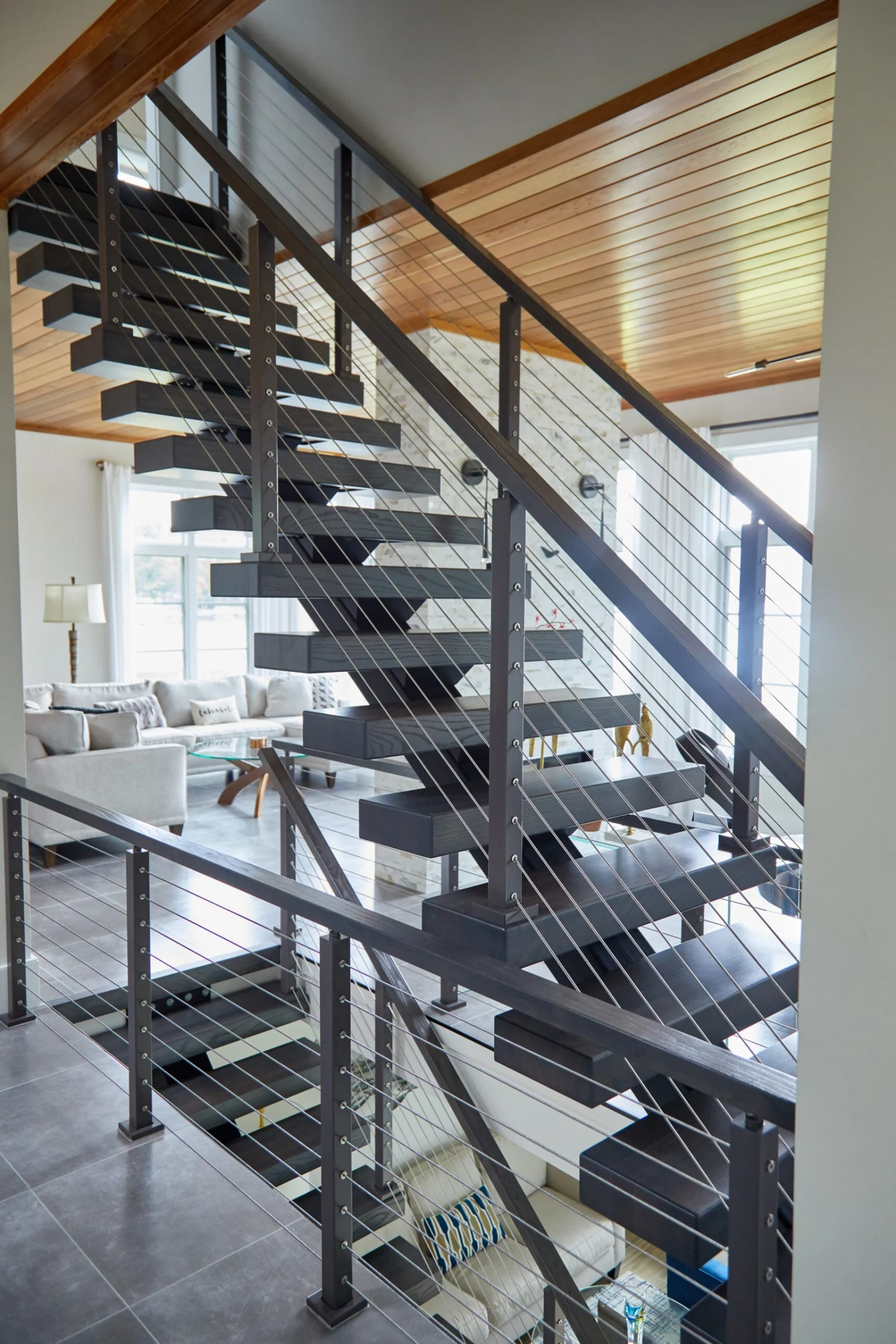 Stair and landing cable railing viewed from the floor below