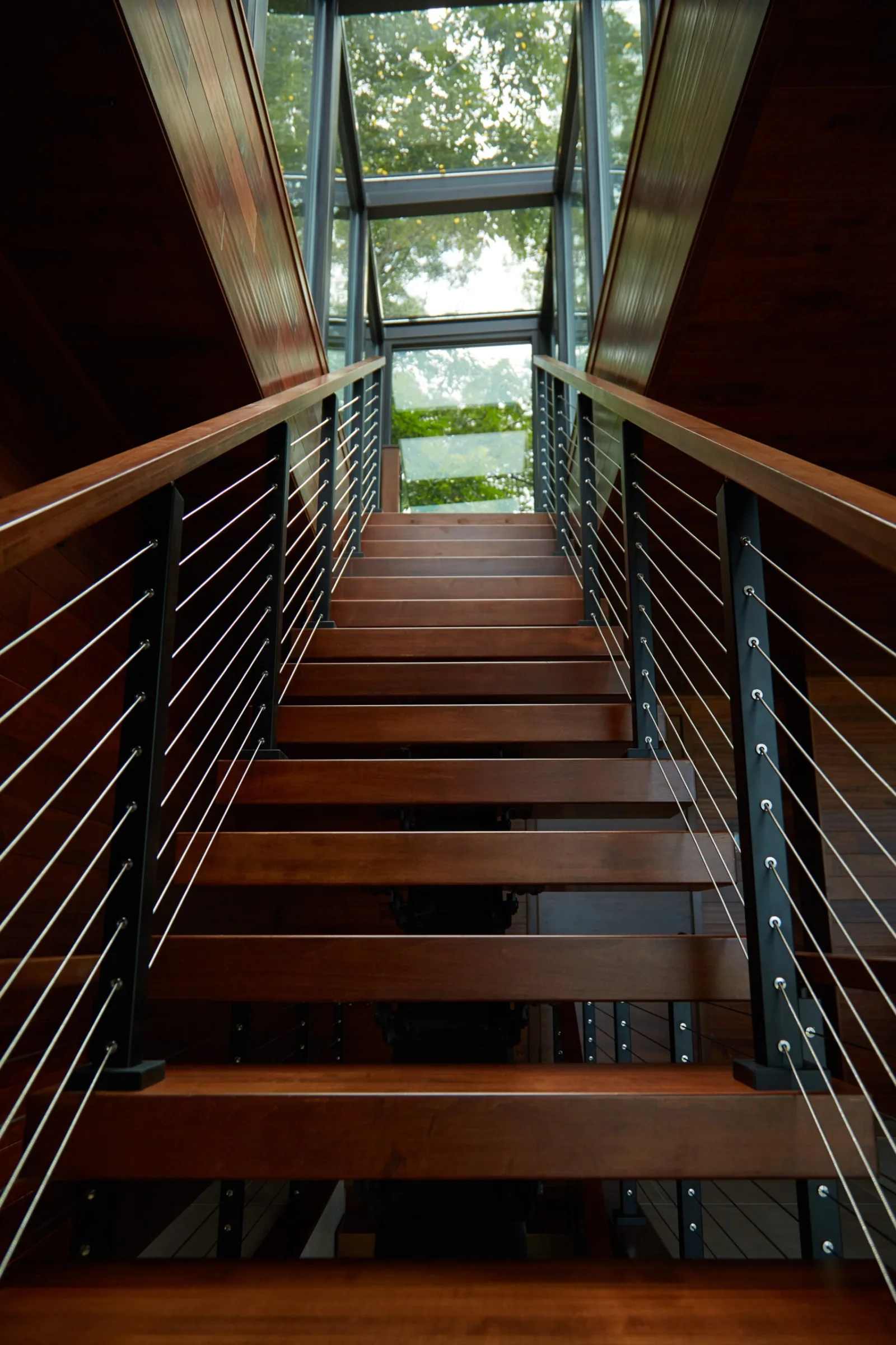 Looking up the flight between cable runs toward a glazed gable