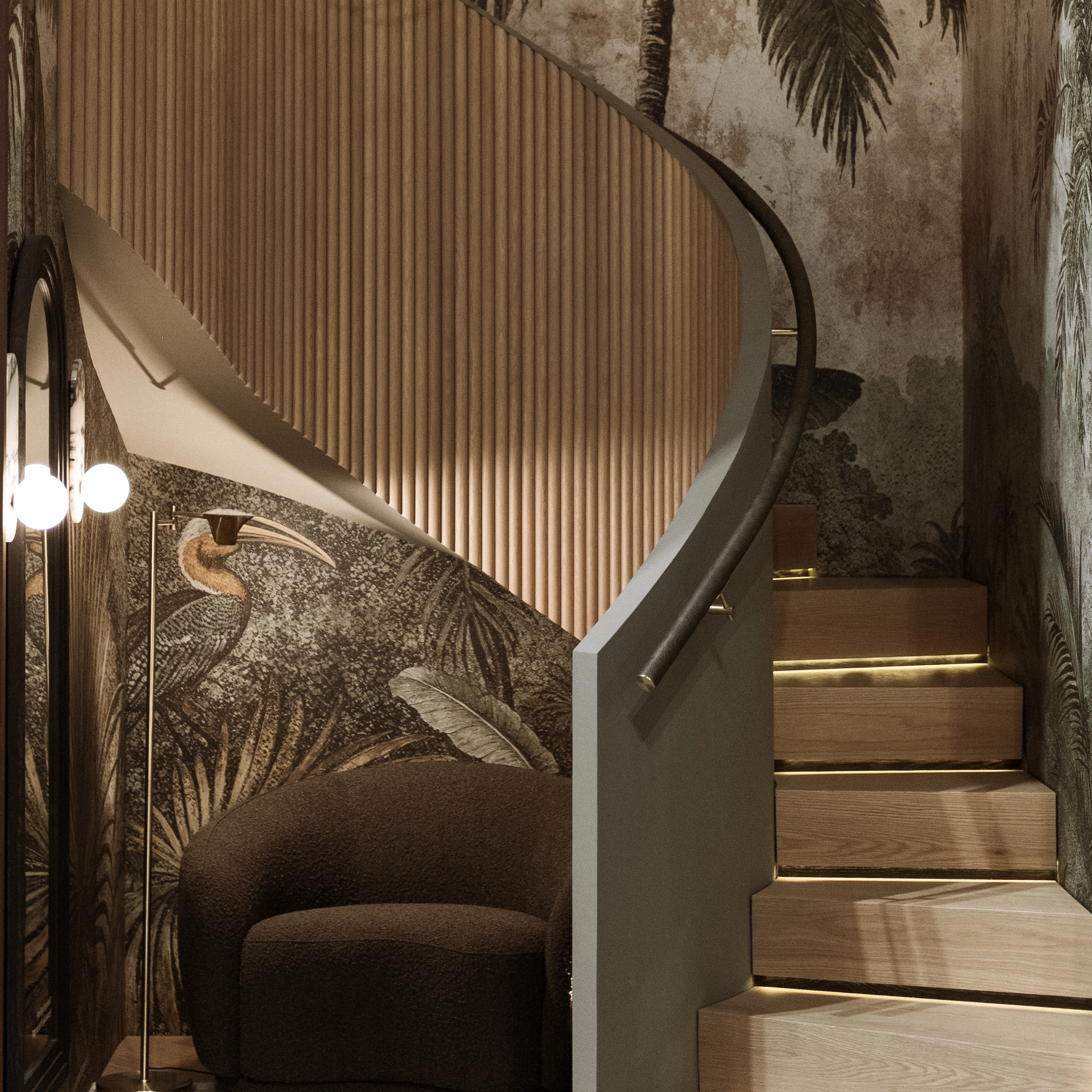 Curved stair and handrail staged against a botanical mural and lounge chair
