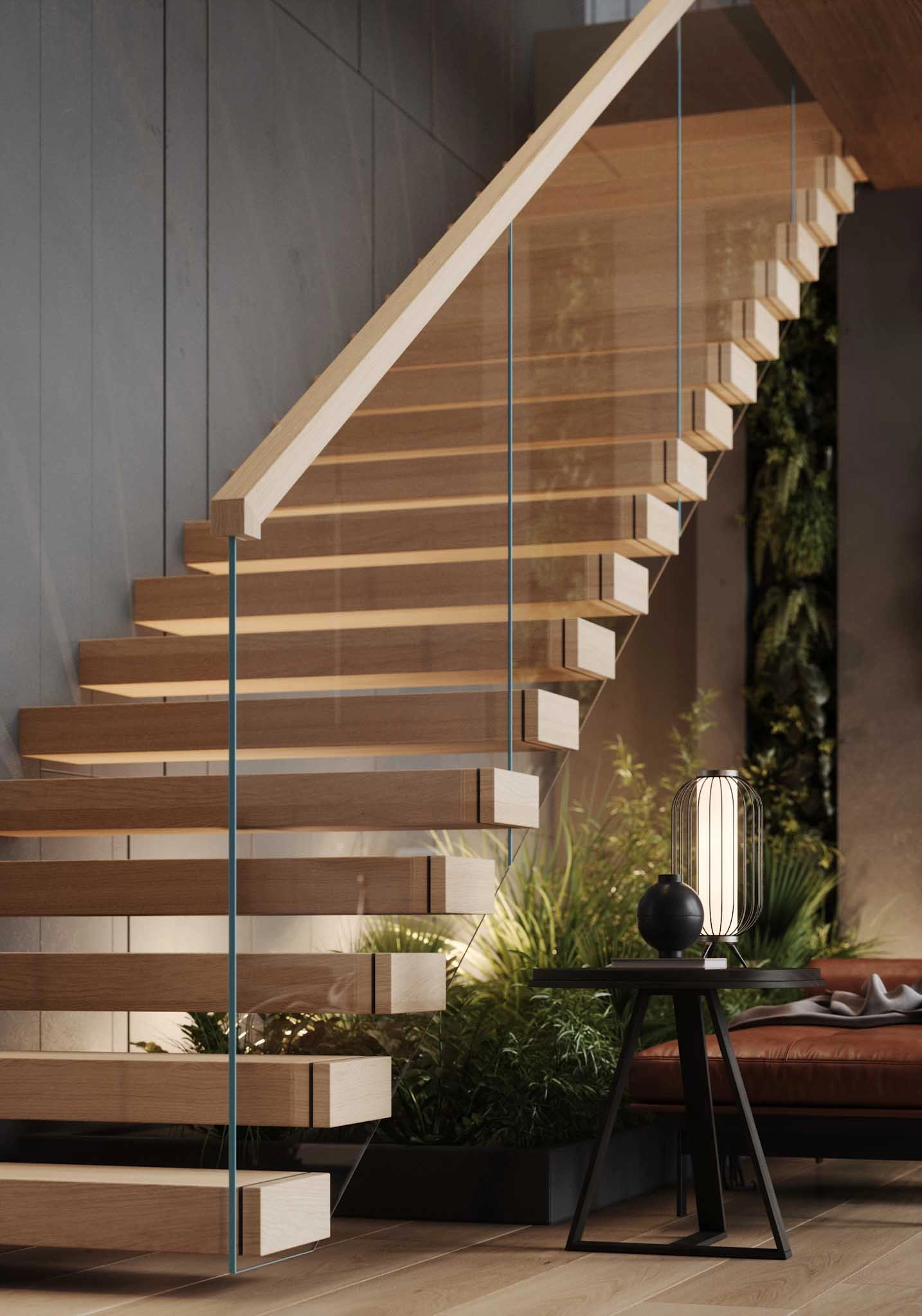 Glass panels rise flush with stair treads above a planted bed and bench